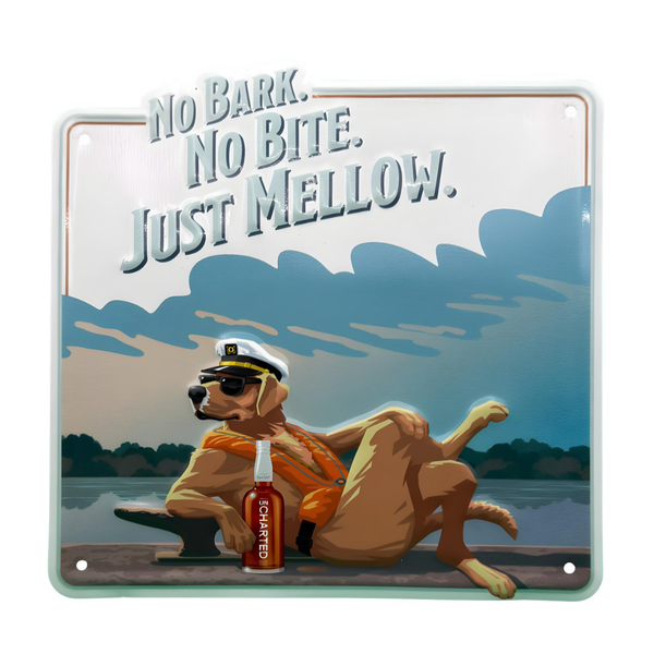 Decorative sign with a dog in a cap and sunglasses holding a bottle, with text 'No Bark. No Bite. Just Mellow.'